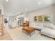 Inviting living room with modern decor, hardwood floors, and open layout to the kitchen at 4010 Citra Ln, Charlotte, NC 28217