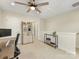Bright office featuring built-in shelves, a modern desk, and neutral carpet at 4010 Citra Ln, Charlotte, NC 28217