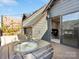 Relaxing rooftop deck with outdoor seating, a fire pit and a view into the home office at 4010 Citra Ln, Charlotte, NC 28217