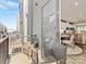 Cozy outdoor patio with comfortable seating, providing a view towards the interior kitchen at 4010 Citra Ln, Charlotte, NC 28217