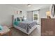 Bedroom featuring bed with upholstered headboard and throw pillows at 4023 Vista Pine Dr, Charlotte, NC 28215