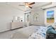 Serene main bedroom features a tray ceiling, natural light, and a calm color palette at 4023 Vista Pine Dr, Charlotte, NC 28215