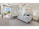 Serene main bedroom features a tray ceiling, natural light, and a calm color palette at 4023 Vista Pine Dr, Charlotte, NC 28215