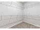 Walk-in closet with carpet flooring and white shelving at 4023 Vista Pine Dr, Charlotte, NC 28215