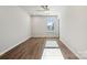 Bedroom featuring hardwood floors, ceiling fan, and recessed lighting at 4027 Vista Pine Dr, Charlotte, NC 28215