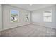 Bright bedroom with three windows allowing for natural light at 4027 Vista Pine Dr, Charlotte, NC 28215