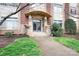 Welcoming entrance features a stone walkway, manicured landscaping, and covered entryway, creating curb appeal at 404 N Laurel Ave # 18, Charlotte, NC 28204