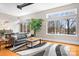 Inviting living room with hardwood floors, large windows and modern decor at 404 N Laurel Ave # 18, Charlotte, NC 28204