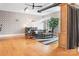 Charming living room with open floor plan, stylish furniture and hardwood floors at 404 N Laurel Ave # 18, Charlotte, NC 28204