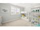 Shared bedroom with bunk beds, neutral walls and bright natural light at 448 Iverson Way, Charlotte, NC 28203
