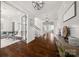 Spacious foyer with hardwood floors, stylish decor, and open access to other rooms at 448 Iverson Way, Charlotte, NC 28203