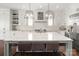 Bright kitchen featuring a large island with seating, stainless steel appliances, and modern lighting at 448 Iverson Way, Charlotte, NC 28203