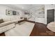 Inviting living room with hardwood floors, stylish decor, and a comfortable sectional sofa at 448 Iverson Way, Charlotte, NC 28203