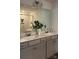Elegant bathroom with double sink vanity, granite countertop, framed mirror, and separate tiled shower at 4710 Lakeview Rd # Lot 10, Charlotte, NC 28216