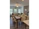 Open-concept living and dining area featuring hardwood floors and modern furnishings at 4710 Lakeview Rd # Lot 10, Charlotte, NC 28216