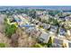 Wide aerial view of suburban homes in tree lined neighborhood at 6458 Chadwell Ct # 30, Indian Land, SC 29707
