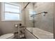 Well-lit bathroom with a bathtub-shower and a storage shelf at 662 University Dr, Rock Hill, SC 29730
