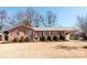 Charming brick home with a covered carport and landscaped front yard at 662 University Dr, Rock Hill, SC 29730