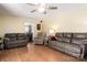 Spacious living room with a ceiling fan and comfortable leather seating at 662 University Dr, Rock Hill, SC 29730