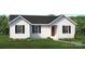 Charming single-story home with white siding, black shutters, and a well-manicured lawn at 703A W Carolina Ave, Bessemer City, NC 28016
