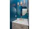 Stylish powder room with custom mirror, sink, and hardware at 7512 Walkup Rd, Waxhaw, NC 28173
