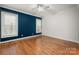 Spacious bedroom with hardwood floors and windows at 7512 Walkup Rd, Waxhaw, NC 28173