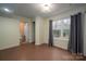 Bedroom featuring an ensuite bath and a big window with blackout curtains at 7512 Walkup Rd, Waxhaw, NC 28173