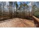 Large wooden deck overlooking the wooded backyard at 7512 Walkup Rd, Waxhaw, NC 28173
