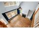 Open living room with hardwood floors, fireplace, and natural light at 7512 Walkup Rd, Waxhaw, NC 28173