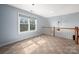 Carpeted loft room with window view at 7512 Walkup Rd, Waxhaw, NC 28173