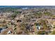 Aerial view of homes in a wooded neighborhood near a lake at 8670 Carroll St, Hickory, NC 28601