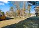 Expansive backyard with mature trees, offering a serene outdoor space at 8670 Carroll St, Hickory, NC 28601