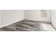 Empty bedroom with wood grain flooring and natural light at 8670 Carroll St, Hickory, NC 28601
