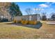 Back of home and yard showing small decks at 8670 Carroll St, Hickory, NC 28601