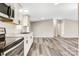 Spacious kitchen with stainless appliances, stone countertops and modern lighting at 8670 Carroll St, Hickory, NC 28601