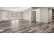 Spacious living area featuring modern floors, neutral walls, and ample natural light at 8670 Carroll St, Hickory, NC 28601