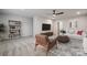Spacious living room with neutral colors, a ceiling fan, a TV, and comfortable seating at 9096 El Sworth Dr, Sherrills Ford, NC 28673