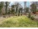 Large, well-maintained backyard featuring a classic bird bath at 10031 Bora Bora Dr, Tega Cay, SC 29708