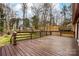 Spacious wooden deck to enjoy the beautiful trees and backyard at 10031 Bora Bora Dr, Tega Cay, SC 29708