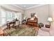 Bright office space with a bay window, hardwood floors, and ample room for a desk and musical instruments at 1017 Patrick Johnston Ln, Davidson, NC 28036
