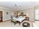 Spacious main bedroom featuring a sitting area and ensuite bath at 1017 Patrick Johnston Ln, Davidson, NC 28036