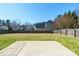 Expansive backyard with a well-maintained lawn and patio area at 1066 Streamlet Way, Monroe, NC 28110