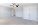 Bedroom featuring neutral walls, carpet, and large closets at 1066 Streamlet Way, Monroe, NC 28110