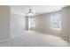 Spacious bedroom with plush carpeting and bright windows at 1066 Streamlet Way, Monroe, NC 28110