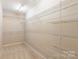 Walk-in closet features wire shelving for optimal storage at 1066 Streamlet Way, Monroe, NC 28110