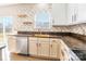 Bright kitchen featuring stainless appliances, butcher block countertops, and stylish backsplash at 1066 Streamlet Way, Monroe, NC 28110