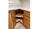 Corner cabinet in the kitchen featuring rotating shelving and ample cabinet space at 110 2Nd St, Spencer, NC 28159