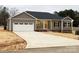 Beautiful single story home with long driveway and attached two-car garage at 110 Stonehaven Ct, Salisbury, NC 28146