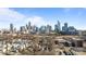 Skyline of Charlotte, NC with neighborhood in view, highlighting the Bank of America Stadium at 1101 W 1St St # 124, Charlotte, NC 28202