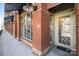 Charming brick building exterior with decorative awnings and large windows at 1101 W 1St St # 124, Charlotte, NC 28202